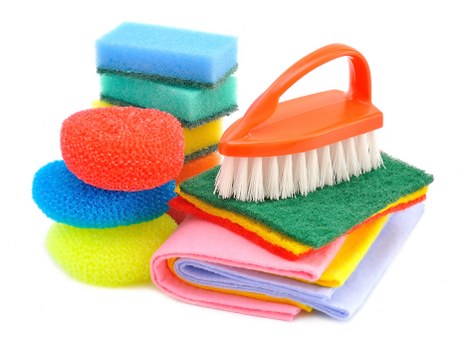 Staff member applying carpet cleaner with protective care